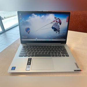 It’s new, is a Lenovo Ideapad 1i and is open box